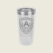A frosted white travel tumbler with a clear lid and a gray Littoral Distribution shield logo on the front, set against a solid light beige background.
