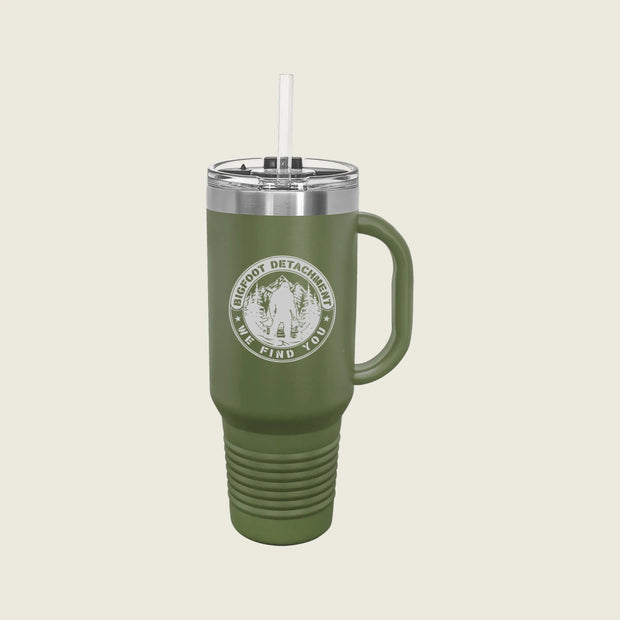 green travel mug with bigfoot logo engraved