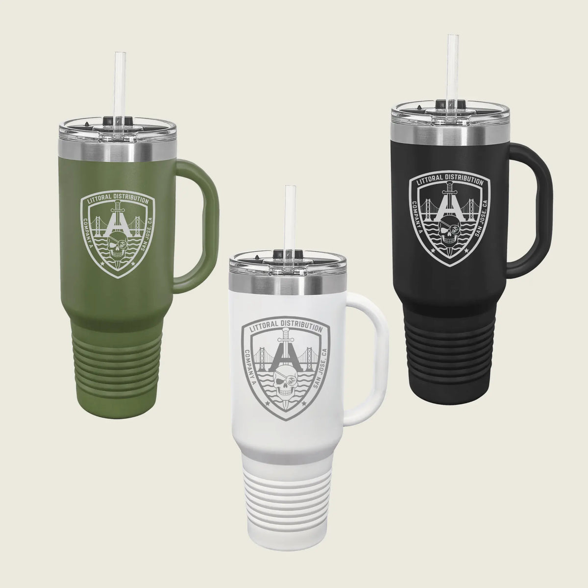 Three insulated handled tumblers with straws on a light beige background: one olive green, one black, and one white. 