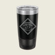Black insulated tumbler with a logo on a beige background