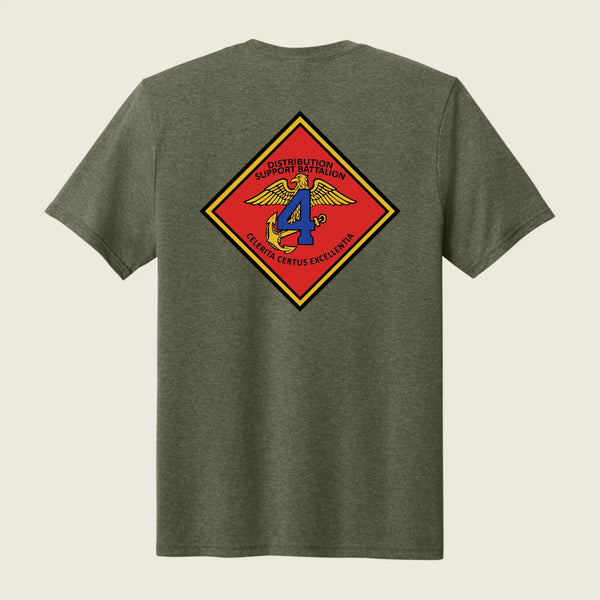 Green t-shirt with a colorful emblem on the back against a beige background