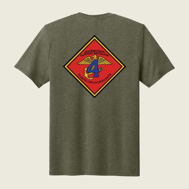 Green t-shirt with a colorful emblem on the back against a beige background