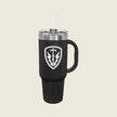 black mug with a silver logo engraved on the front
