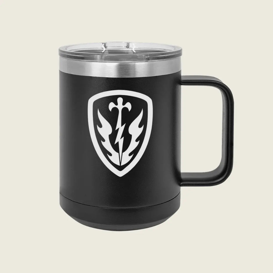 black mug with a silver logo engraved on the front 