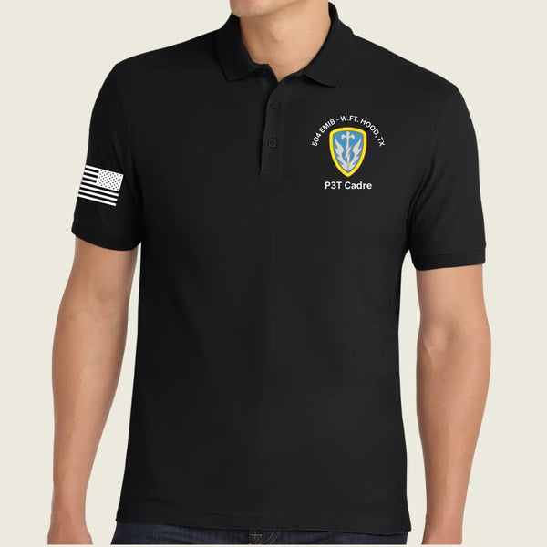 A man wearing a black short-sleeve polo shirt with a white American flag patch on the right sleeve and a white and yellow crest patch on the left chest reading '504th Bn, WFT, HOOT TX' and 'P3T Cadre'.