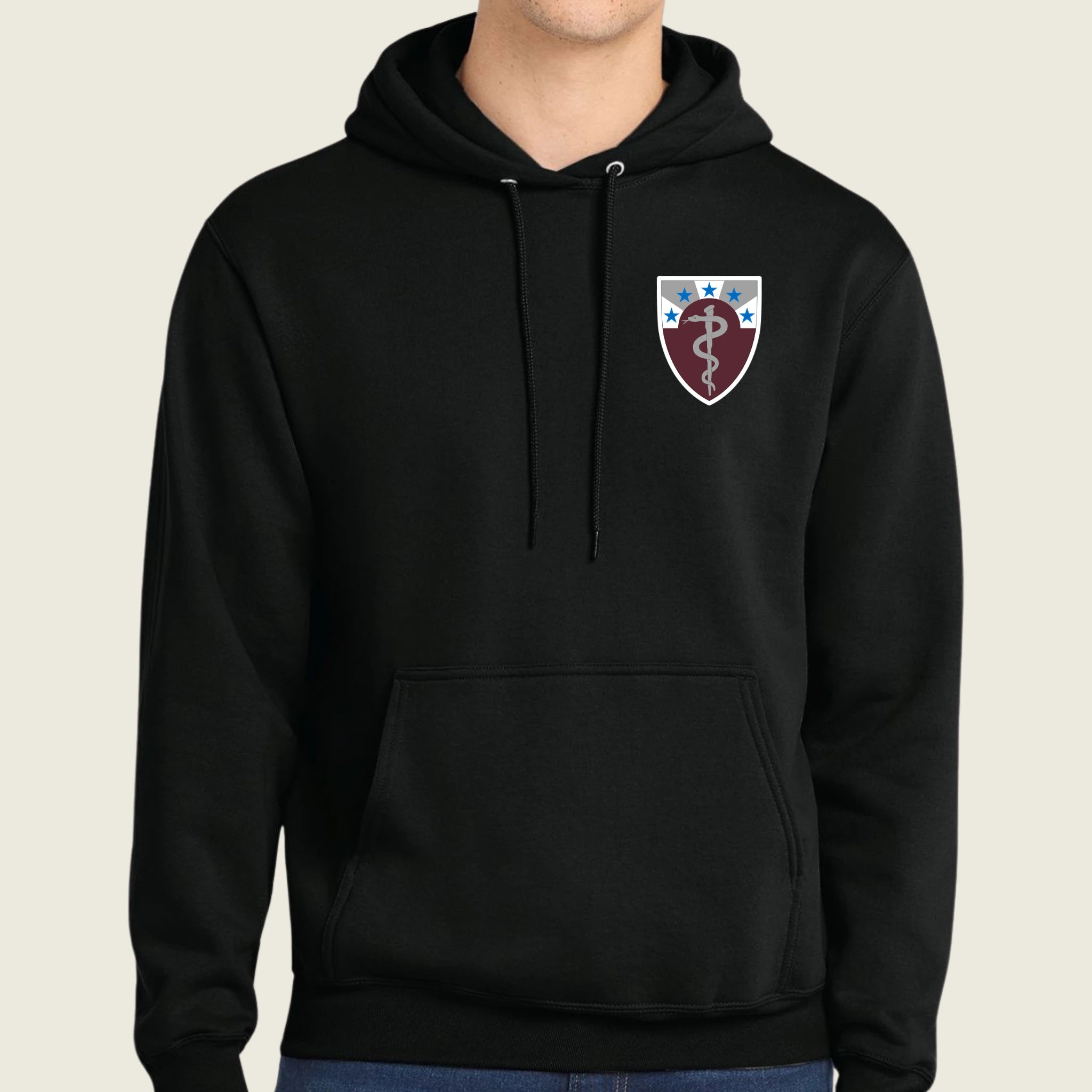 Black hoodie with a logo on the chest