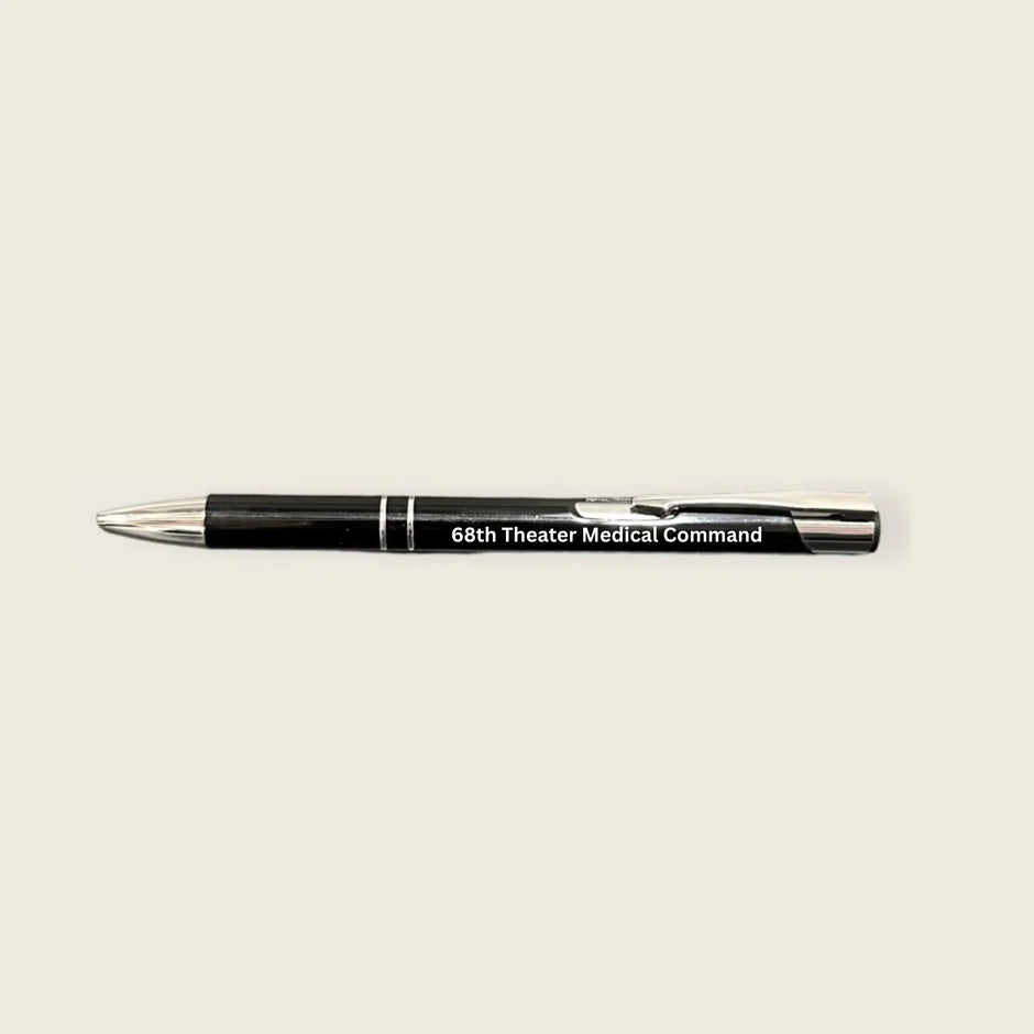 black pen with 68th theater medical command engraved