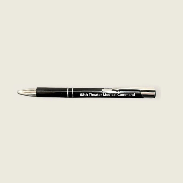 black pen with 68th theater medical command engraved