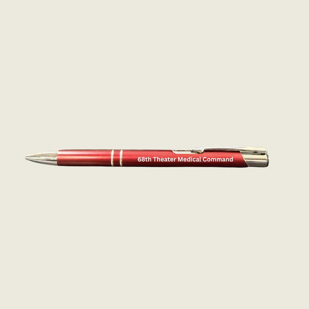 Red pen with '68th Theater Medical Command' text on a beige background