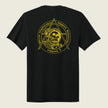 A black short-sleeve t-shirt shown from the back, featuring a large yellow graphic print of an astronaut skull inside a geometric emblem with the text 'Marine Cryptologic Support Battalion Company A'.