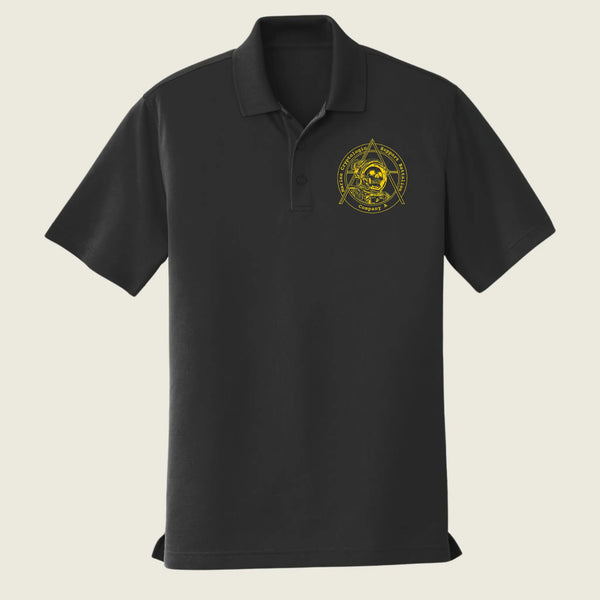 A black short-sleeve polo shirt with a gold circular emblem printed on the left chest, displayed on a solid light beige background.