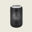 A black insulated can cooler sleeve with a silver aluminum can inserted, featuring a white circular graphic of a skull inside a triangle with the text 'Masonic Theologic Support Battalion Company X'. The product is shown on a solid light beige background.