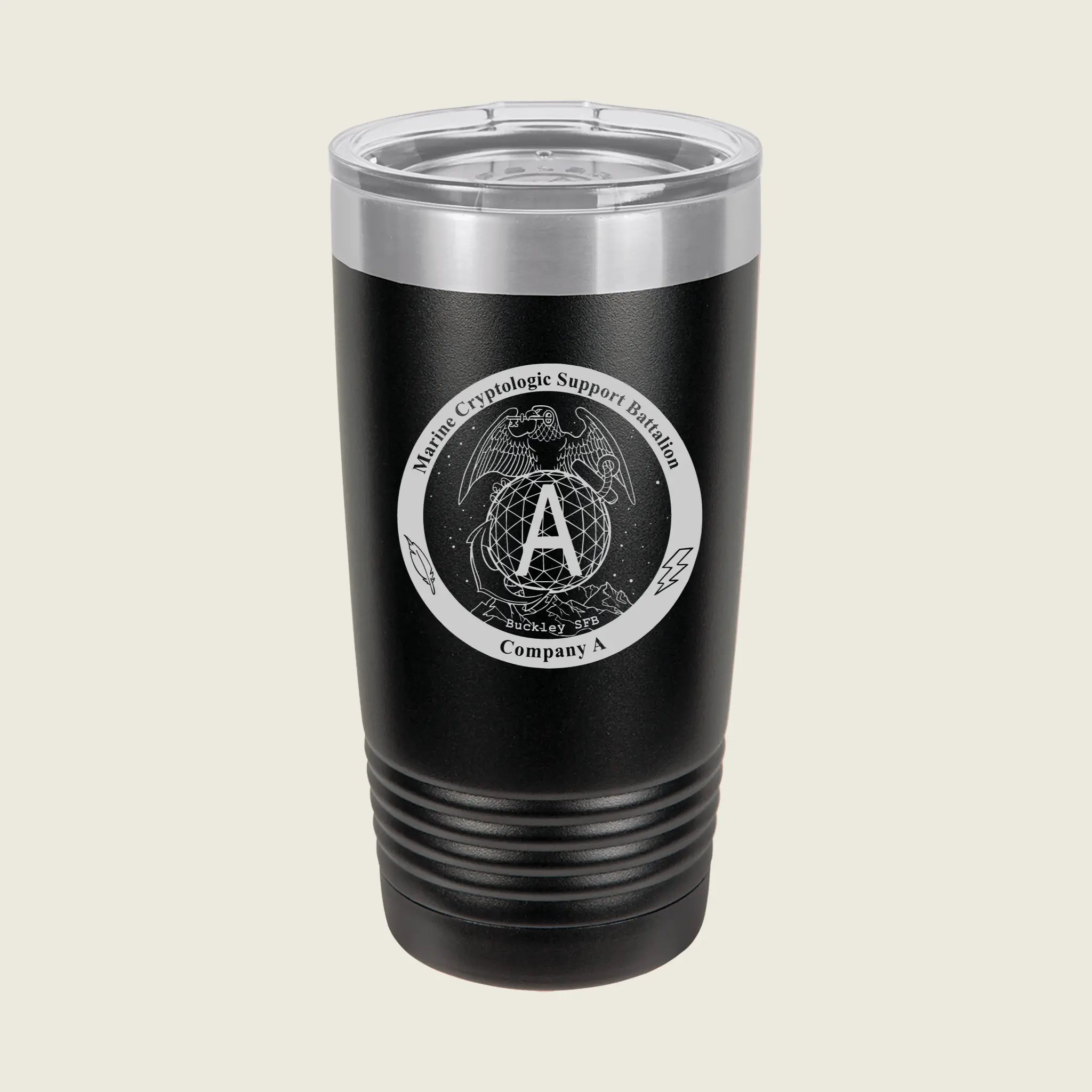 A black insulated travel tumbler with a clear lid, featuring a circular white graphic on the front with a central letter A and decorative text.