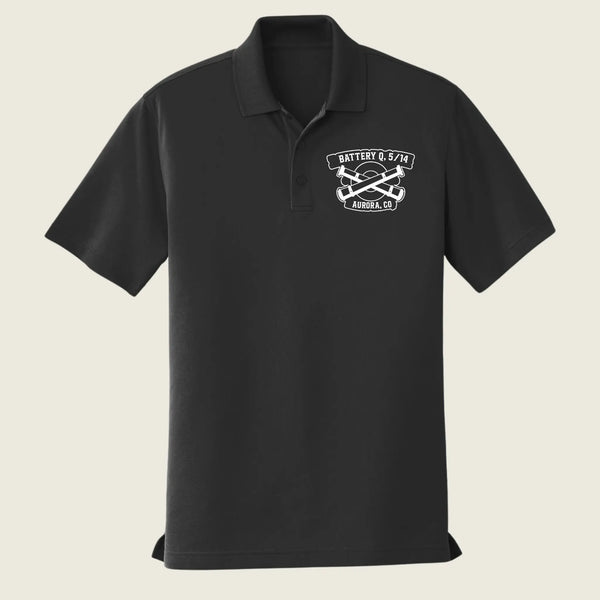 A black short-sleeve polo shirt with a white embroidered logo on the left chest reading 'BATTERY Q 5/14 AURORA, CO' around crossed tools, shown on a light beige background.