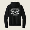 A black pullover hoodie shown from the back, featuring a white graphic print of crossed cannons with the text 'BATTERY Q, 5/14' and 'AURORA.CO' on a light beige background.