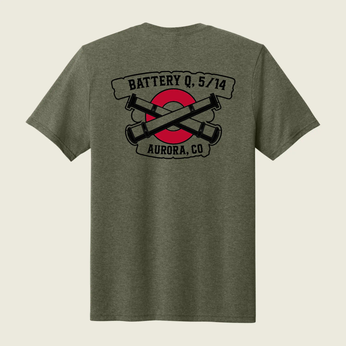 A heather olive green short-sleeve t-shirt shown from the back, featuring a graphic print of crossed black cannons over a red circle with banners reading 'BATTERY Q, 5/14' and 'AURORA, CO'.