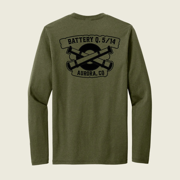 An olive green long-sleeve t-shirt shown from the back, featuring a black graphic print of crossed cannons with banners reading 'BATTERY Q, 5/14' and 'AURORA, CO'.