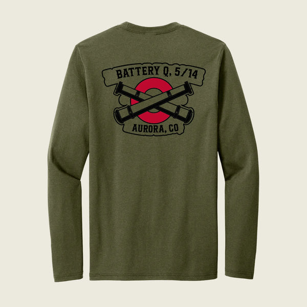 An olive green long-sleeve t-shirt shown from the back, featuring a black and red graphic print with crossed cannons and banners reading 'BATTERY Q, 5/14' and 'AURORA, CO'.