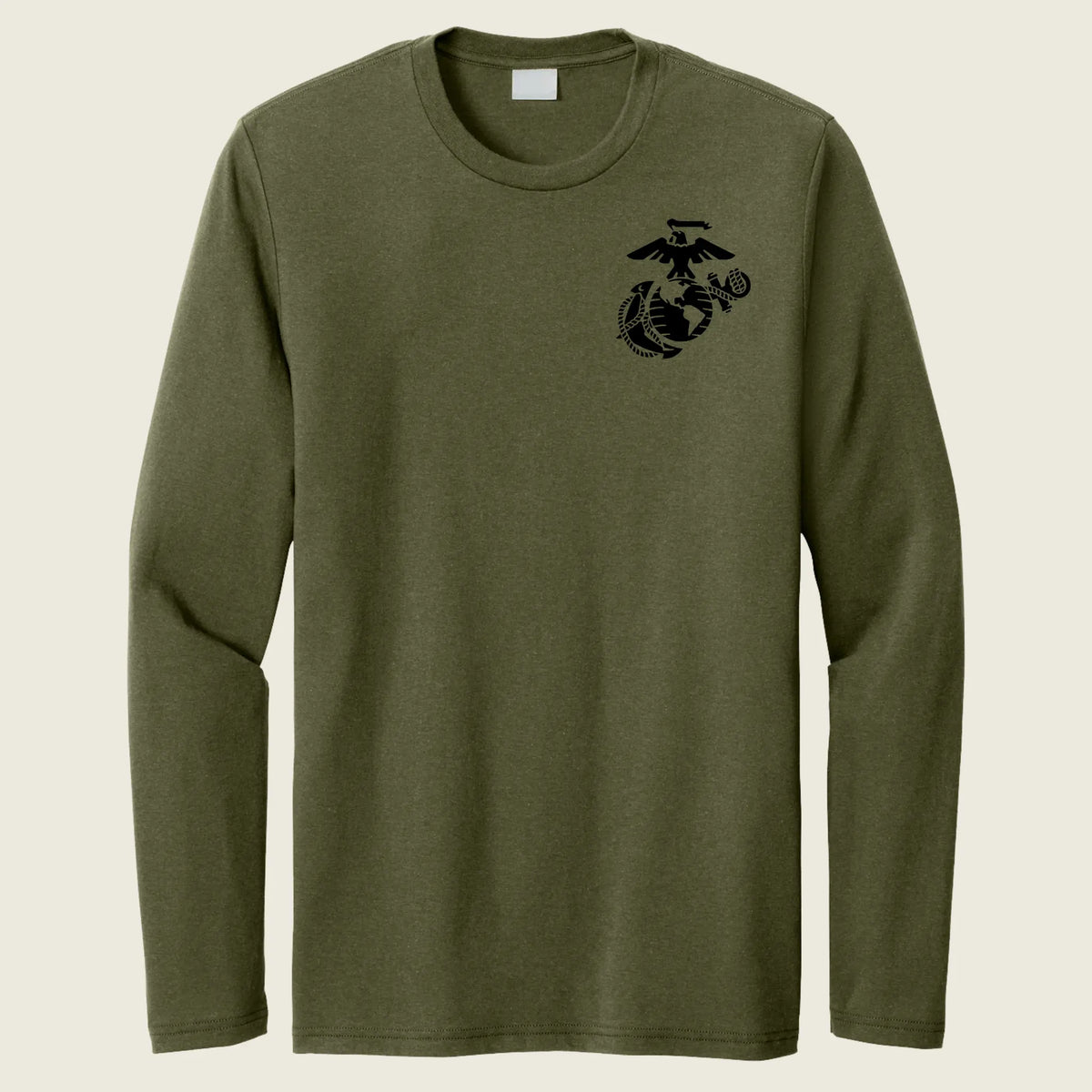 Green long-sleeve shirt with a logo on the chest against a beige background