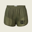 Olive green athletic shorts with a black graphic print on the lower left leg that reads 'BATTERY Q. 5/14 AURORA, CO' with crossed tools, shown on a light beige background.
