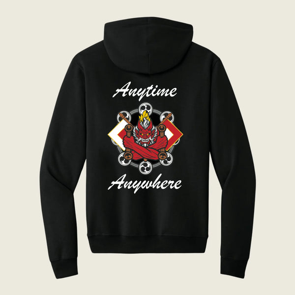 A black pullover hoodie shown from the back, featuring a graphic design with the words 'Anytime Anywhere' in white script and a central red and black dragon illustration with wheels and a skull.