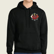 A black pullover hoodie with a small red and white graphic on the left chest, worn by a model against a light beige background.