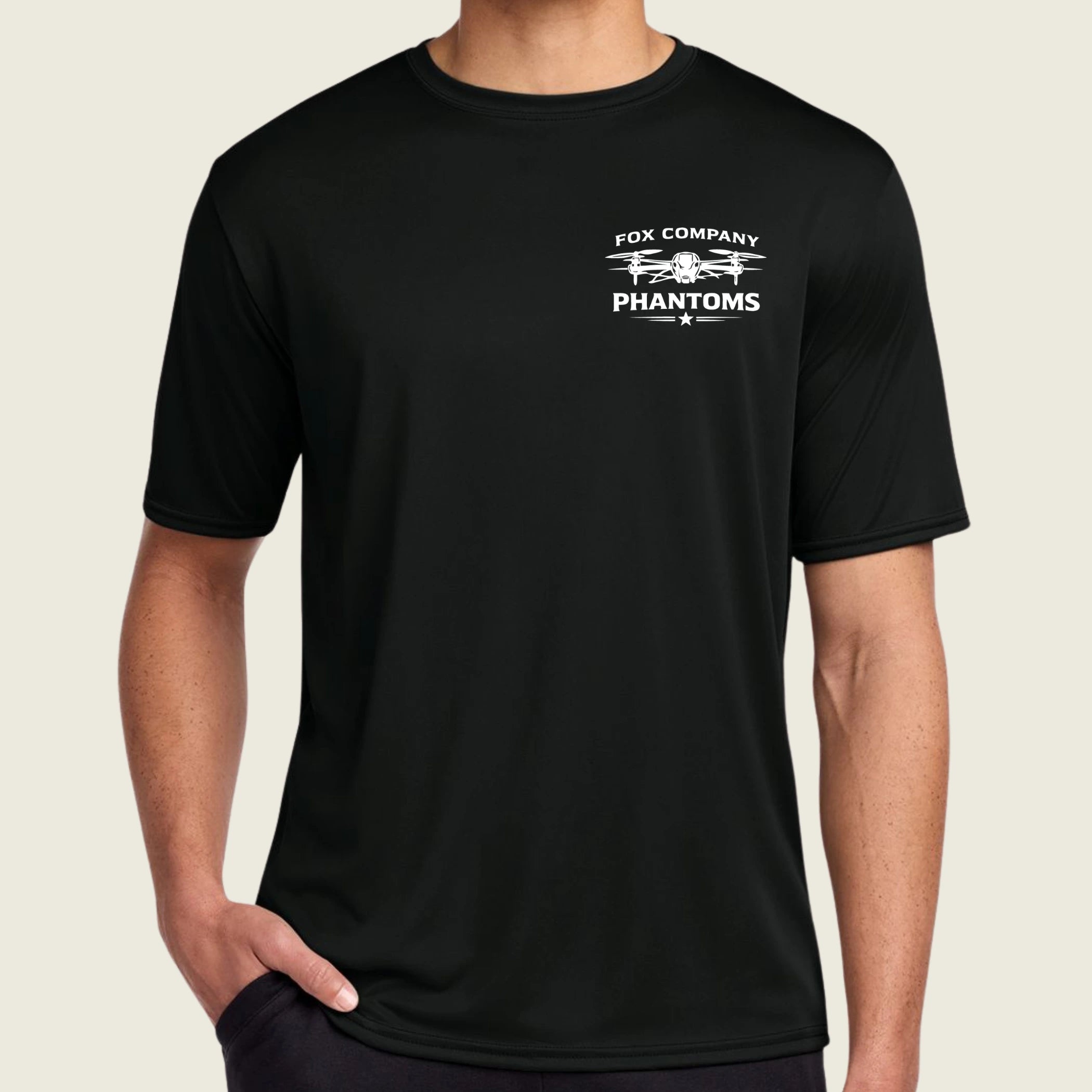 black dri fit shirt with logo printed on front left pocket