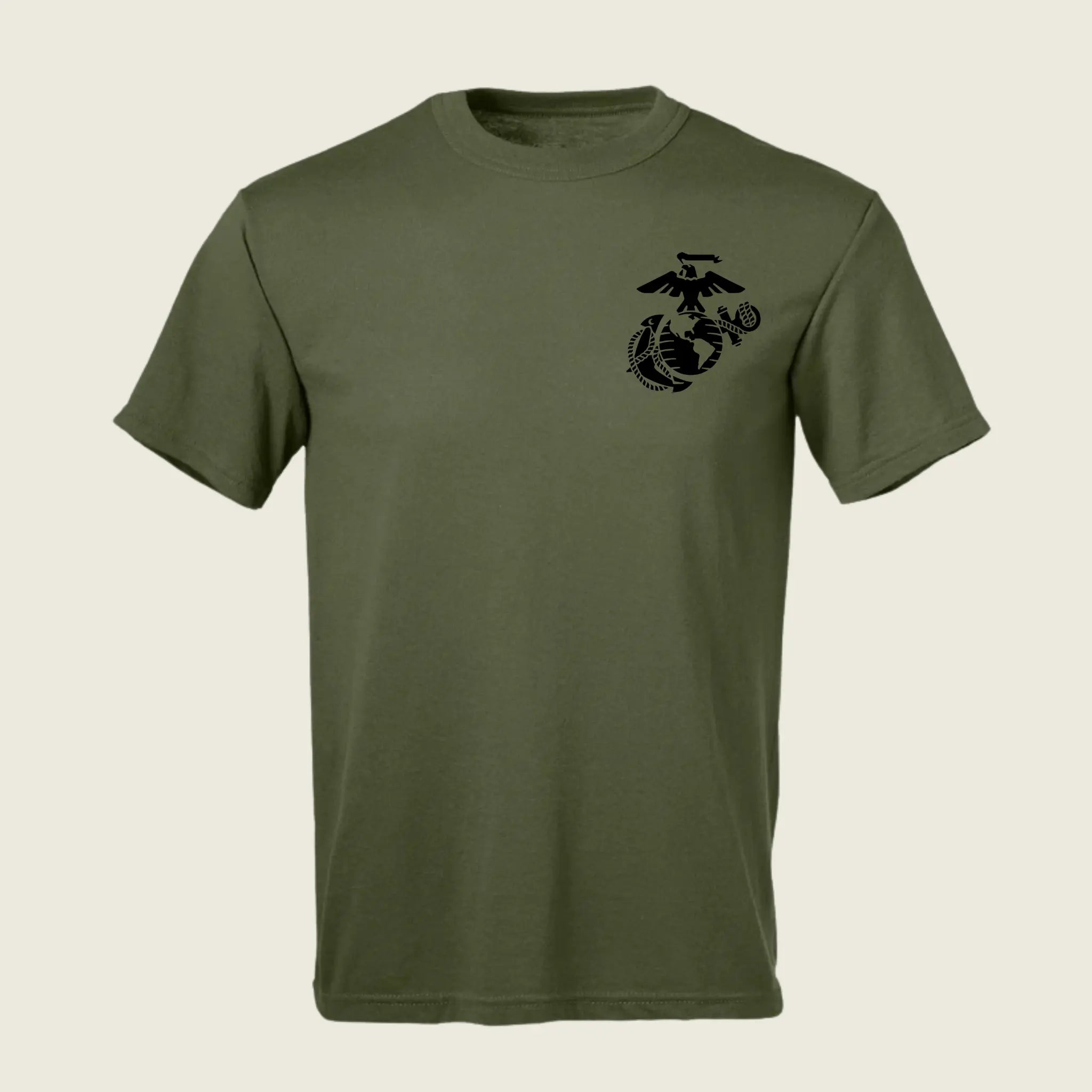 An olive green short-sleeve crewneck t-shirt featuring a black US Marine Corps Eagle, Globe, and Anchor emblem printed on the left chest, displayed against a light beige background.