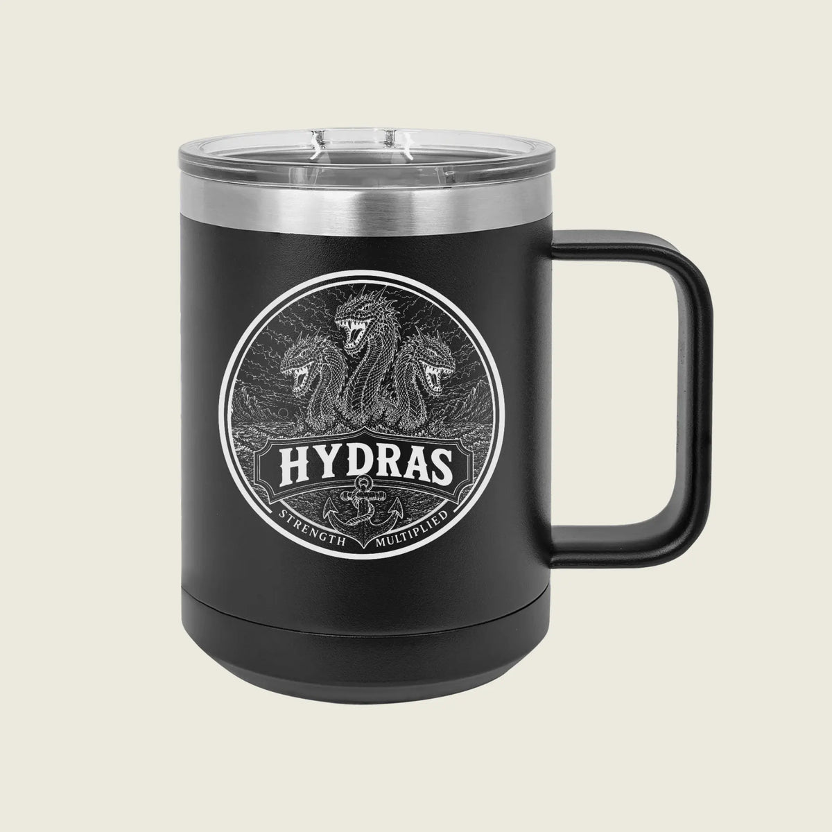 A black insulated travel mug with a clear lid and a black handle, featuring a circular silver graphic of three serpents and the word 'HYDRAS' on the front, set against a light beige background.