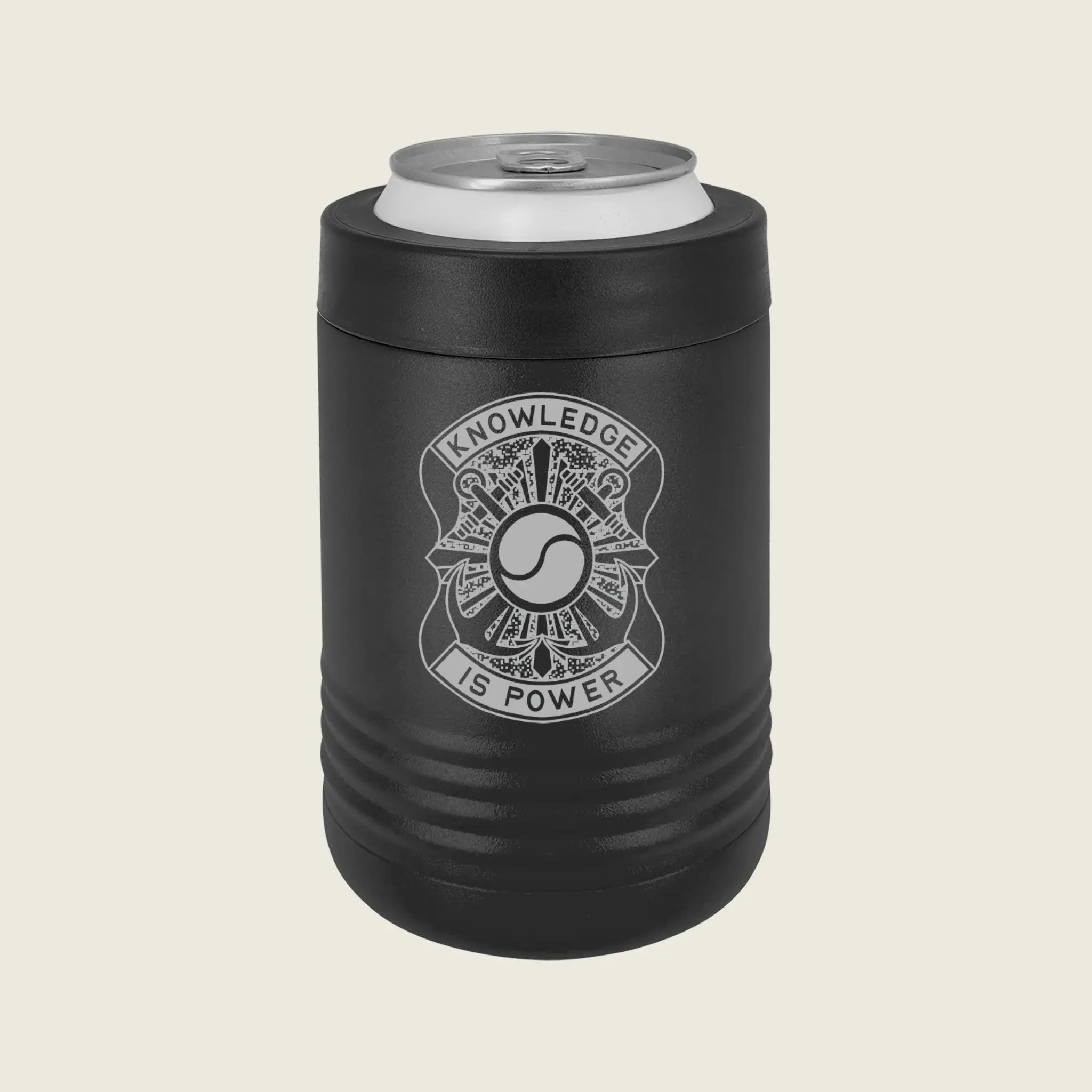A black insulated can cooler sleeve with a silver aluminum can inserted, featuring a white fire department badge graphic with the text 'KNOWLEDGE IS POWER' on a light beige background.
