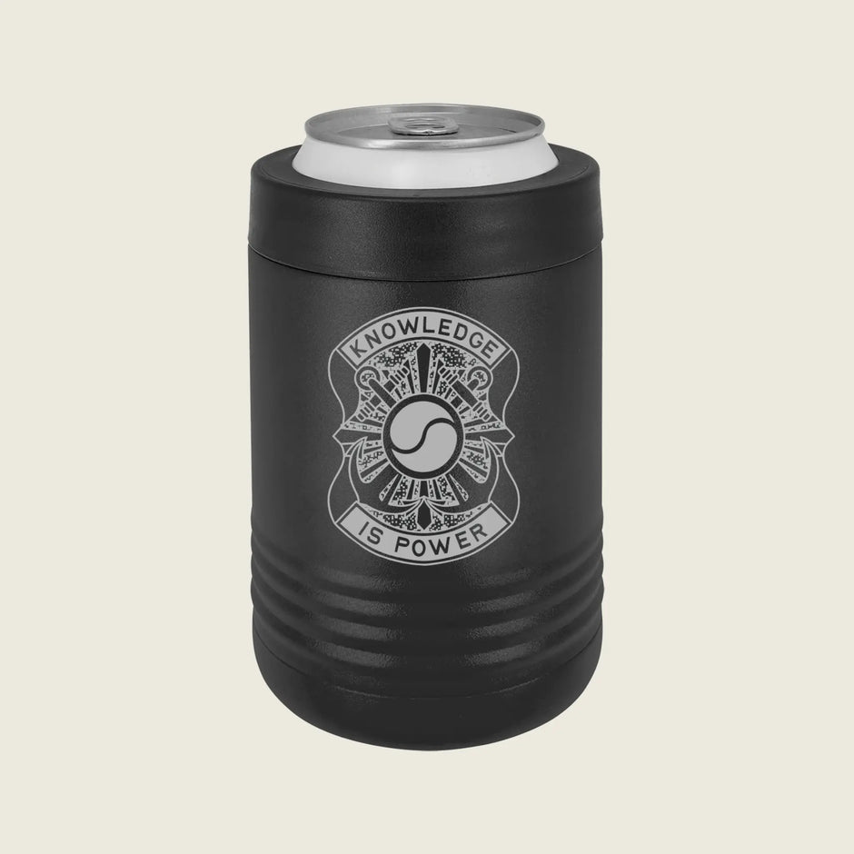 A black insulated can cooler sleeve with a silver aluminum can inserted, featuring a white fire department badge graphic with the text 'KNOWLEDGE IS POWER' on a light beige background.