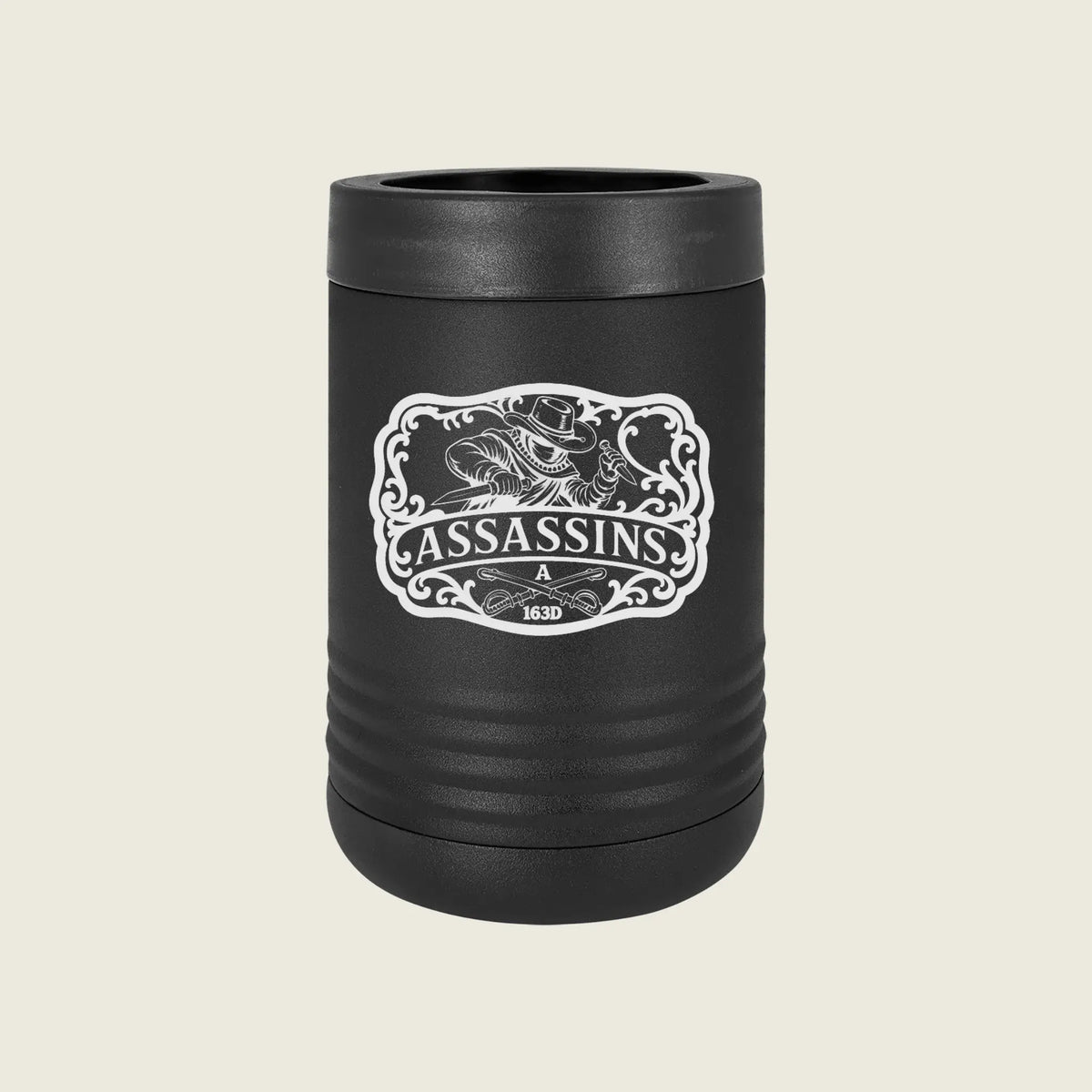 A matte black insulated can cooler with a lid, featuring a white graphic print of a hunting dog and the word 'ASSASSINS' on the front, set against a solid light beige background.