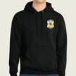 Black hoodie with a colorful emblem on the chest against a beige background