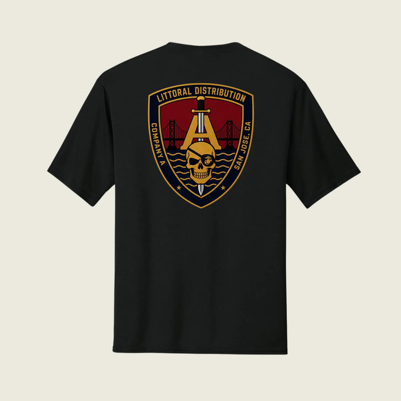 A black short-sleeve t-shirt shown from the back, featuring a large military-style crest graphic on the center back. The graphic includes a gold anchor, a skull, a red background, and the text 'LITTORAL DISTRIBUTION' and 'SAN JOSE, CA'