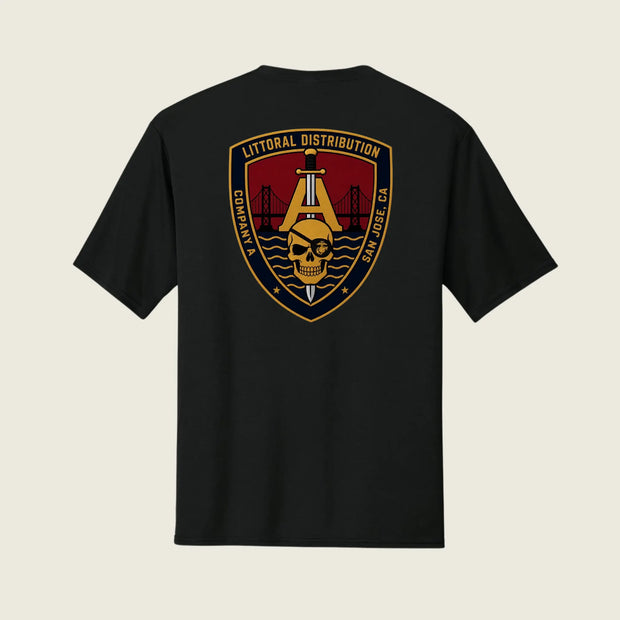 A black short-sleeve t-shirt shown from the back, featuring a large military-style crest graphic on the center back. The graphic includes a gold anchor, a skull, a red background, and the text 'LITTORAL DISTRIBUTION' and 'SAN JOSE, CA'