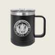 Black mug with 'Bigfoot Detachment' logo on a beige background