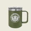 green coffee mug with bigfoot logo on a beige background
