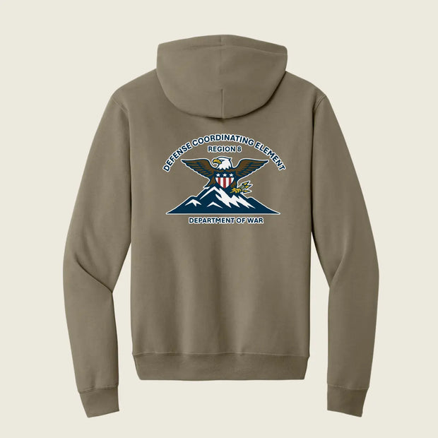 A taupe brown pullover hoodie shown from the back, featuring a large Department of War Regional 1 graphic printed on the center back.