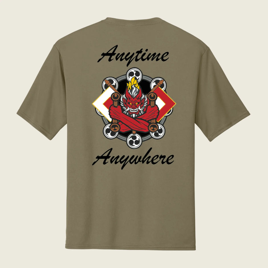 Military logo printed on back of a tan shirt with the words "Anytime and Anywhere" above and below