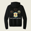 A black zip-up hoodie shown from the back, featuring four military-style insignia patches and the text 'SEEK! SENSE! DESTROY!' printed in white. The background is a solid light beige color.