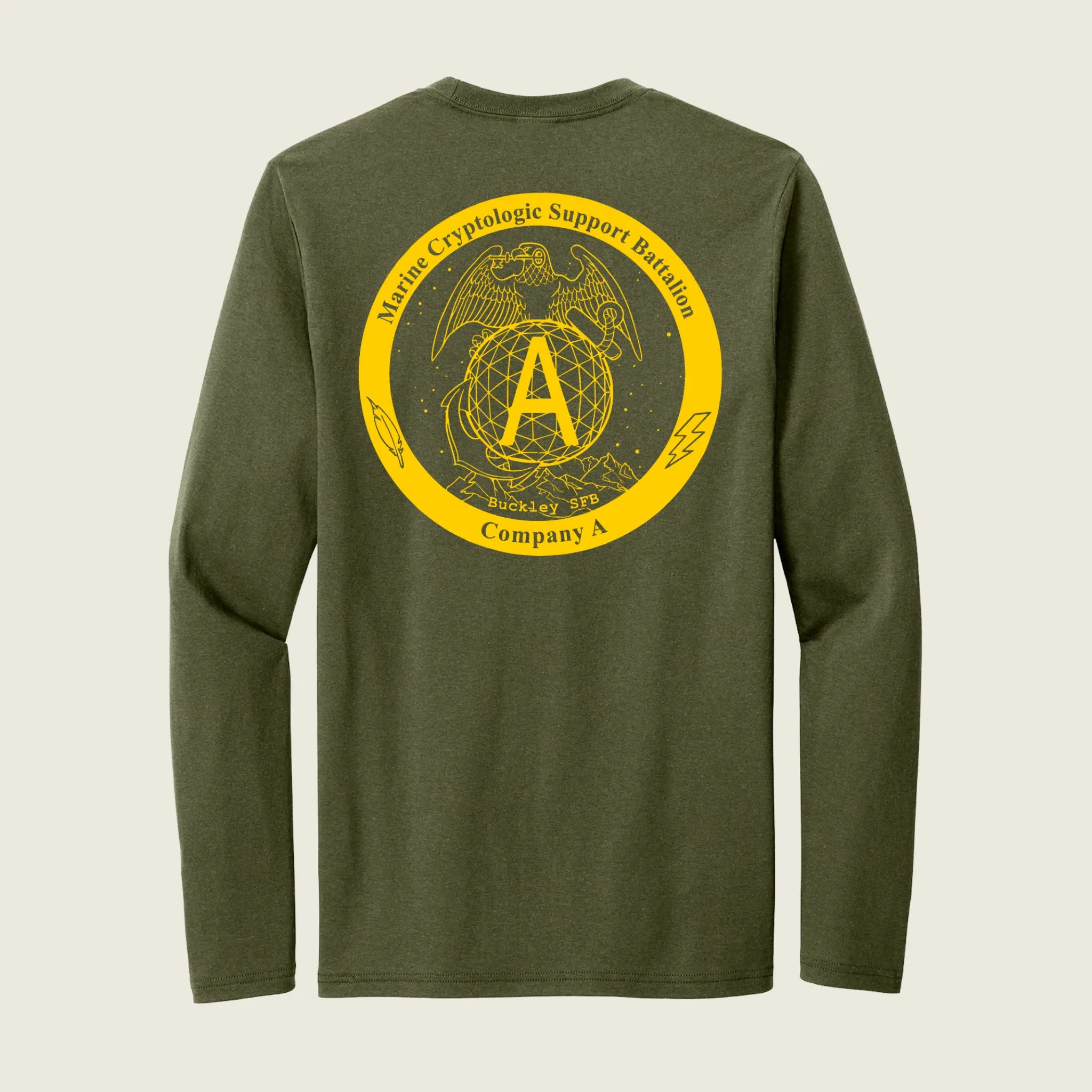 An olive green long-sleeve t-shirt shown from the back, featuring a large yellow circular graphic with the USMC Eagle, Globe, and Anchor emblem, a large letter 'A', and the text 'Marine Cryptologic Support Battalion' and 'Company A'.