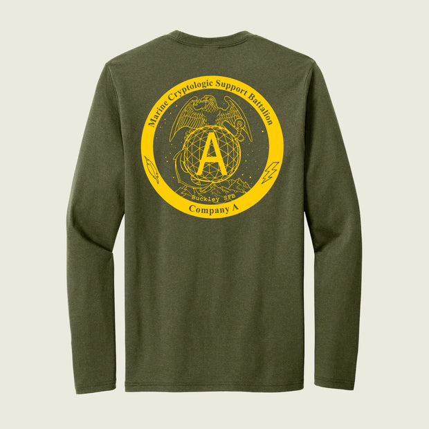 An olive green long-sleeve t-shirt shown from the back, featuring a large yellow circular graphic with the USMC Eagle, Globe, and Anchor emblem, a large letter 'A', and the text 'Marine Cryptologic Support Battalion' and 'Company A'.