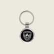 Keychain with a company logo engraved on it in white